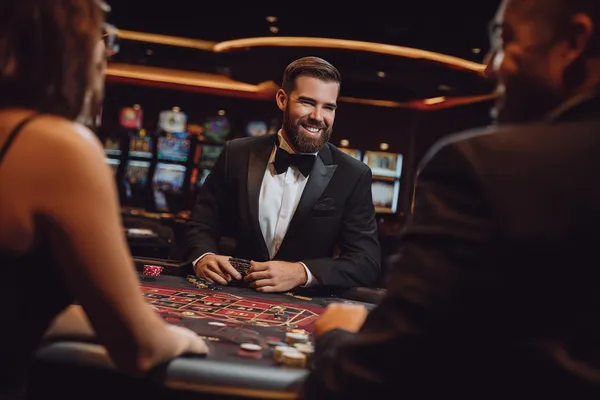 A young woman relaxing with her phone while dynamic casino elements float around her, illustrating the smooth mobile experience offered by the TIKLUCK app.
