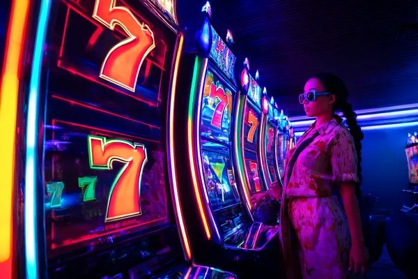 A person using their device against a moody casino-themed background, illustrating the smooth re-entry process at TIKLUCK.
